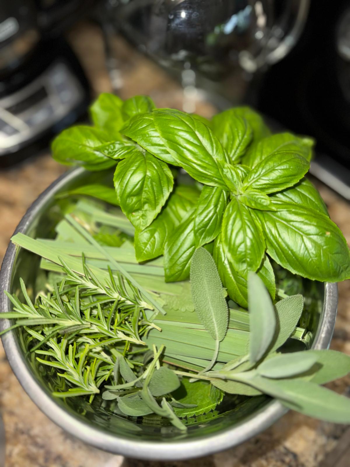 Fresh herbs in a bowl.